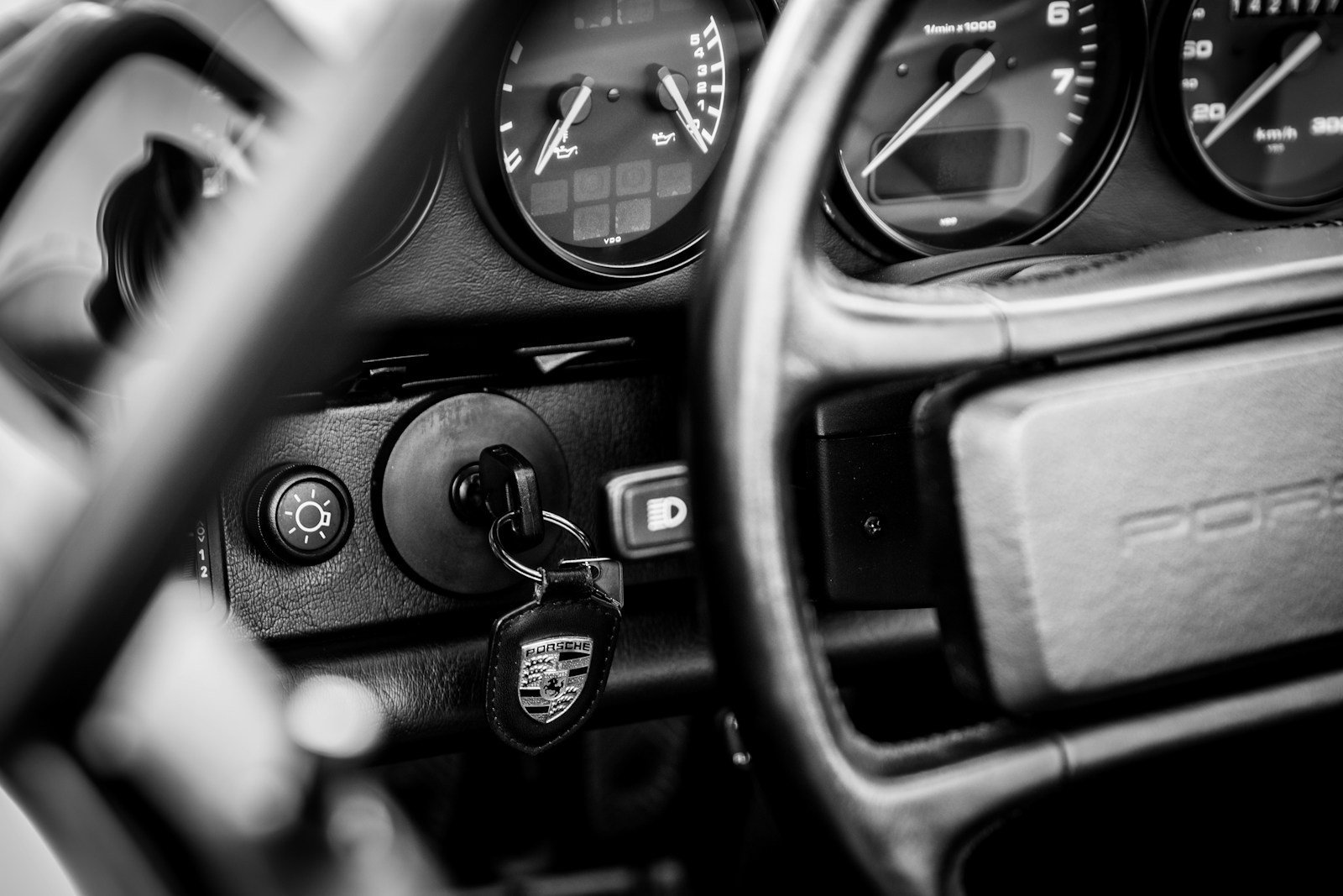 a steering wheel and dashboard of a car