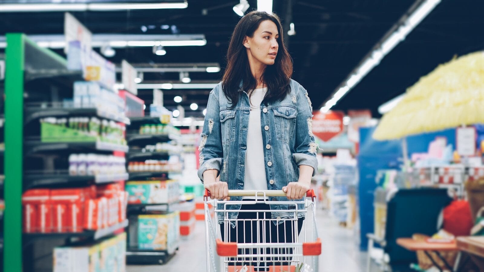 A woman shops in a grocery store.